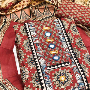 Ethnic Maroon Floral Printed Pure Cotton Dress Material Accented With Fine Neck Embroidery Work