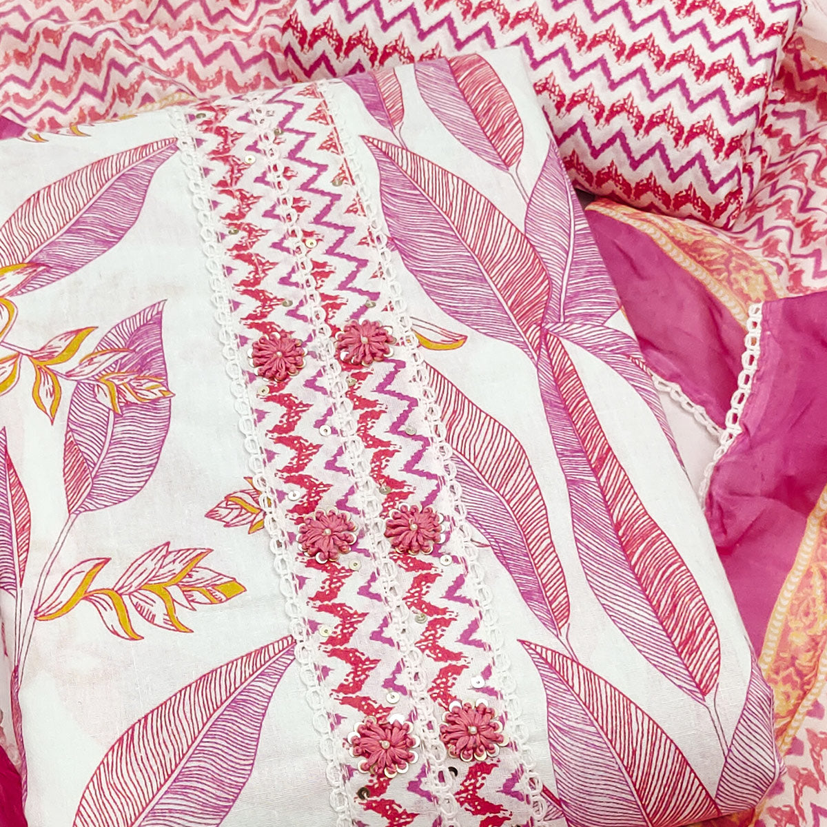 Stylish Pink Floral Pure Cotton Dress Material Accented With Neckline Sequins Embroidery