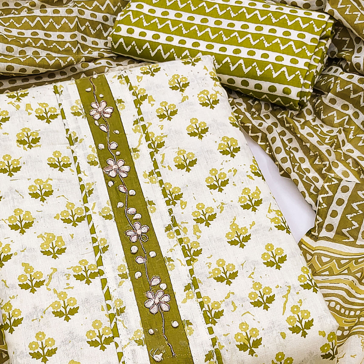 Green Cotton Suit Material Enhanced with Soft Floral Prints