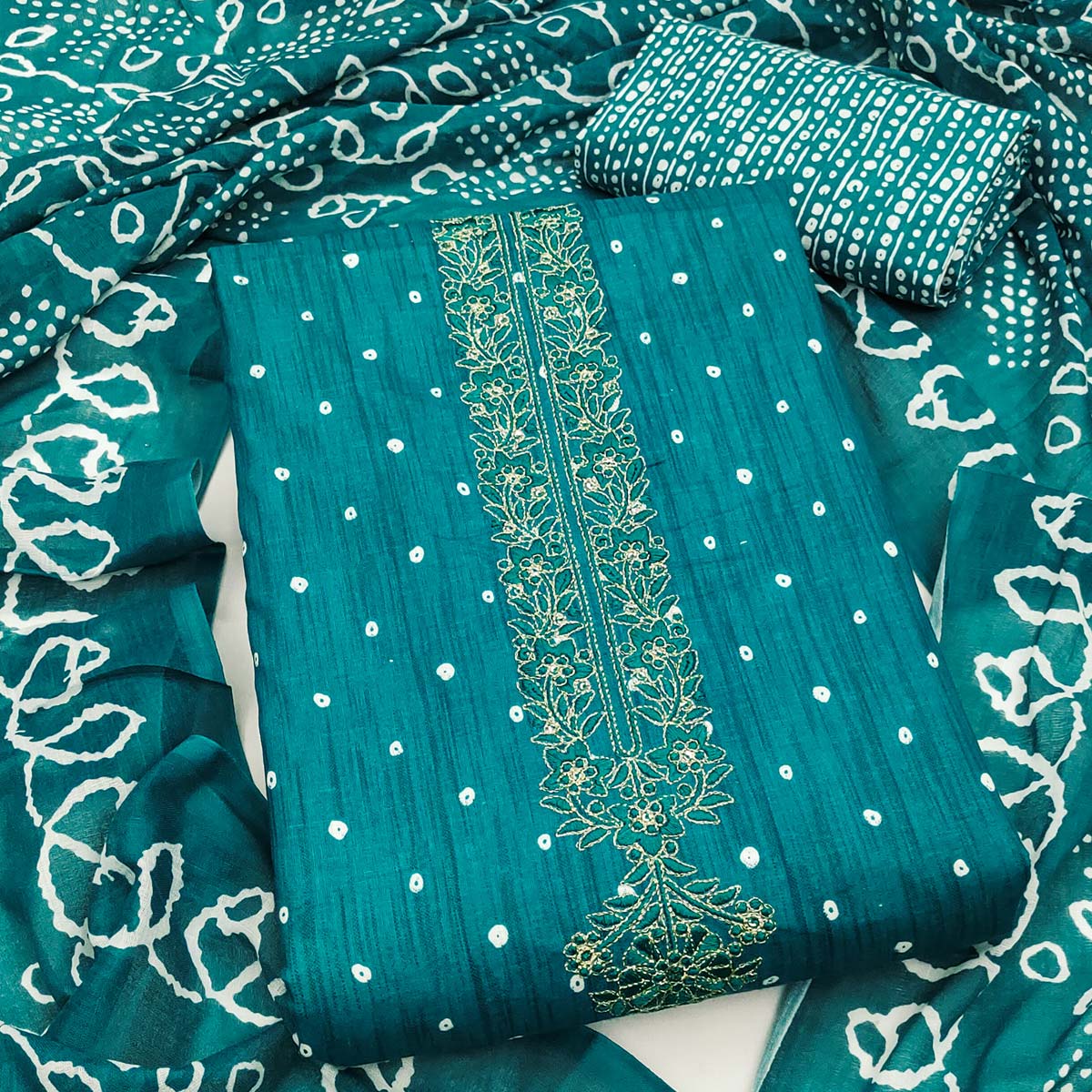 Teal Pure Cotton Dress Material Showcasing Floral & Bandhani Prints With Elegant Neck Embroidery