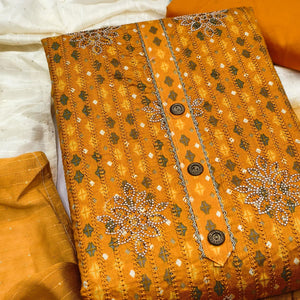 Mustard Cotton Blend Dress Material Adorned With Exquisite Floral Embroidery & Sparkling Stonework