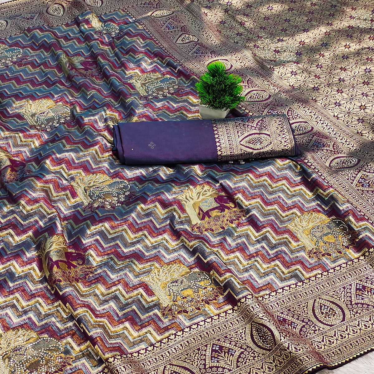 Purple Kanjivaram Silk Weaving Saree Accented With Exquisite Floral & Elephant Motif & Jarkan Work
