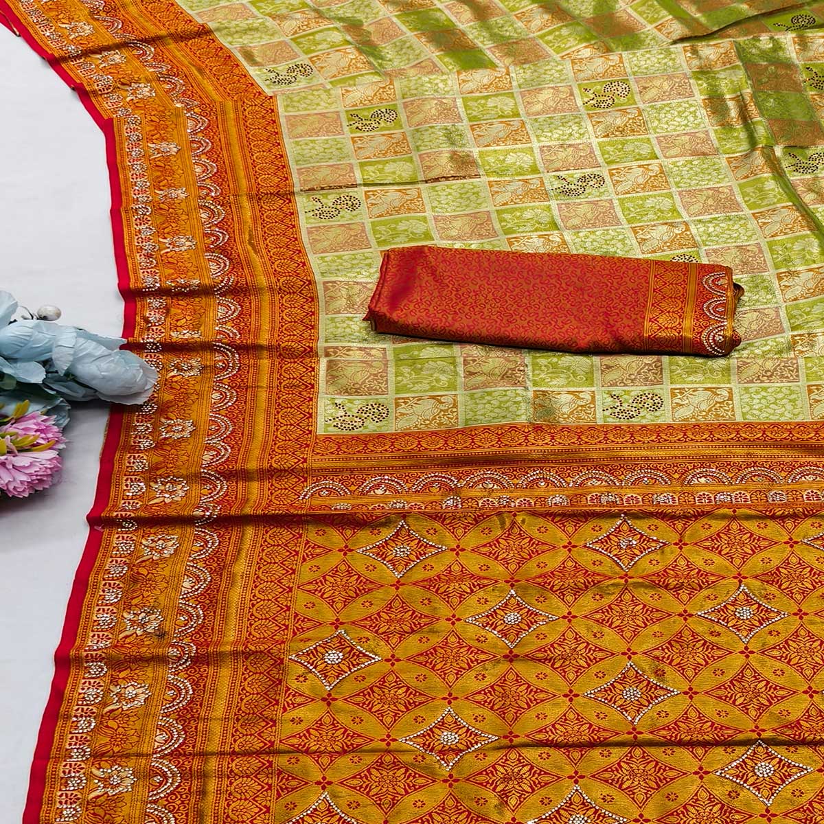Green Lightweight Cotton Silk Saree Highlighted with Intricate Woven Patterns and Swarovski Sparkle