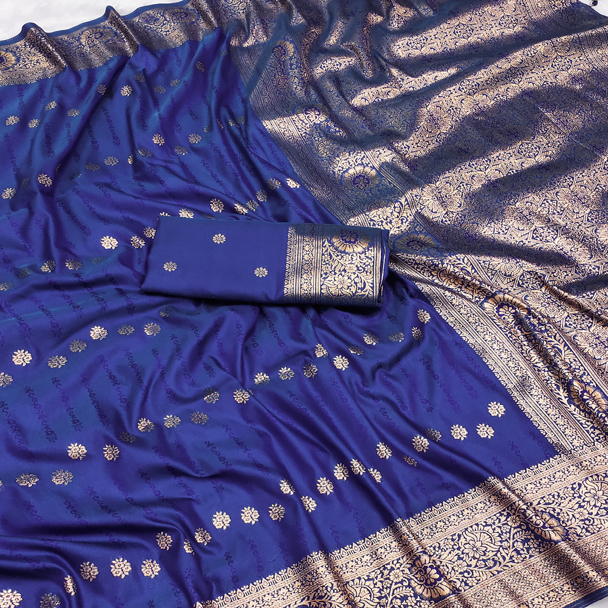 Blue Zari-Woven Cotton Silk Saree Featuring a Graceful Drape and Delicate Tassel Detailing