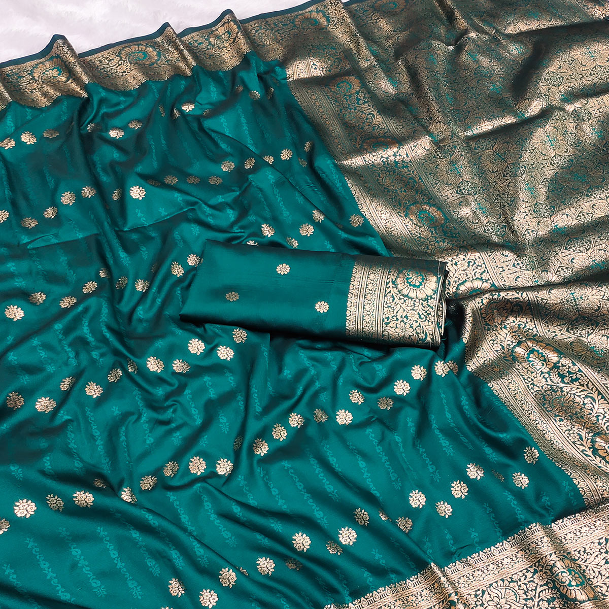 Teal Zari-Woven Cotton Silk Saree Featuring a Graceful Drape and Delicate Tassel Detailing