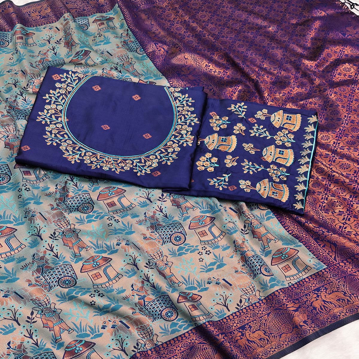Greyish Blue & Royal Blue Tissue Silk Saree Adorned with Intricate Zari Weaving for a Festive Look
