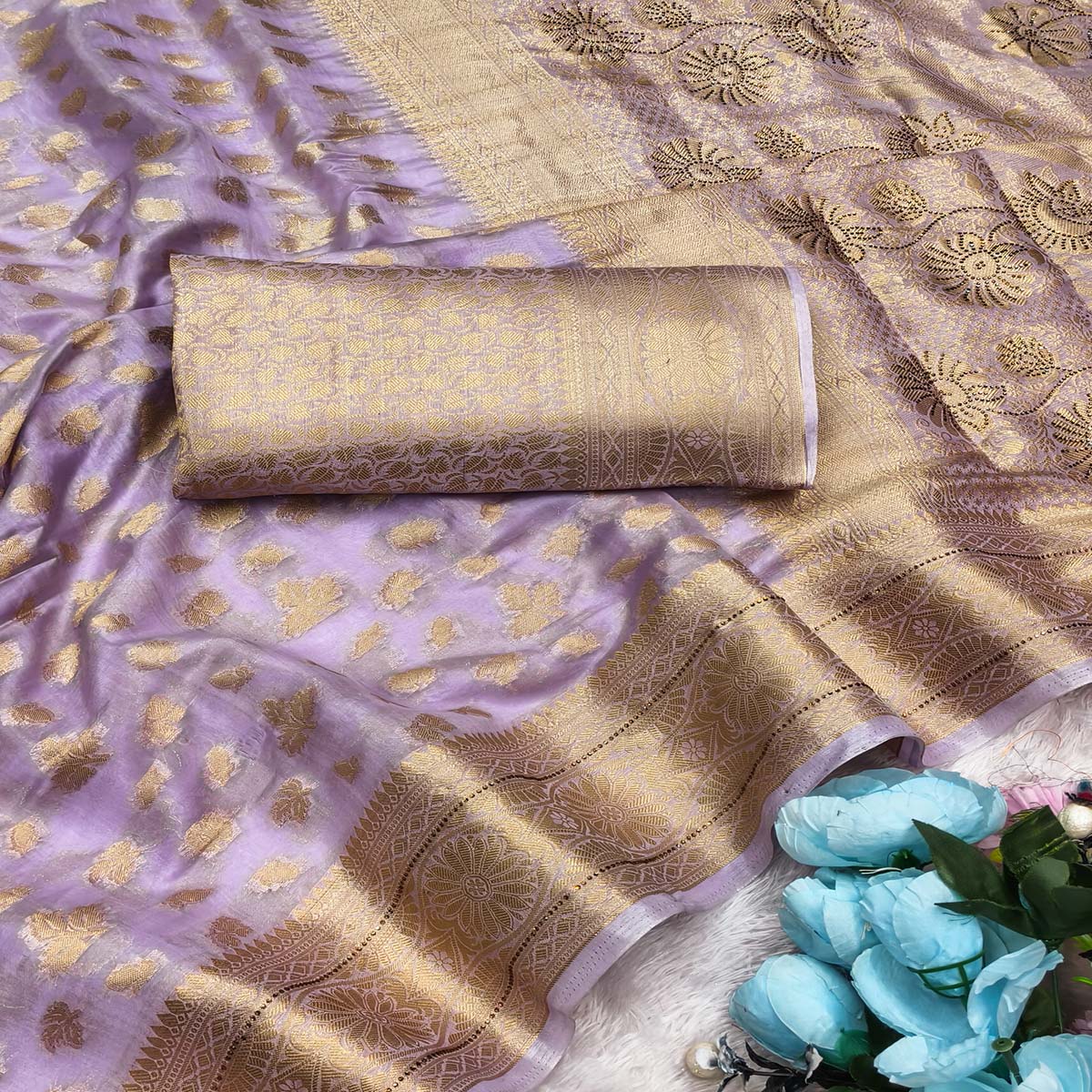 Radiant Lavender Tissue Banarasi Saree With Intricate Floral Zari Weaving & Stone Embellishments