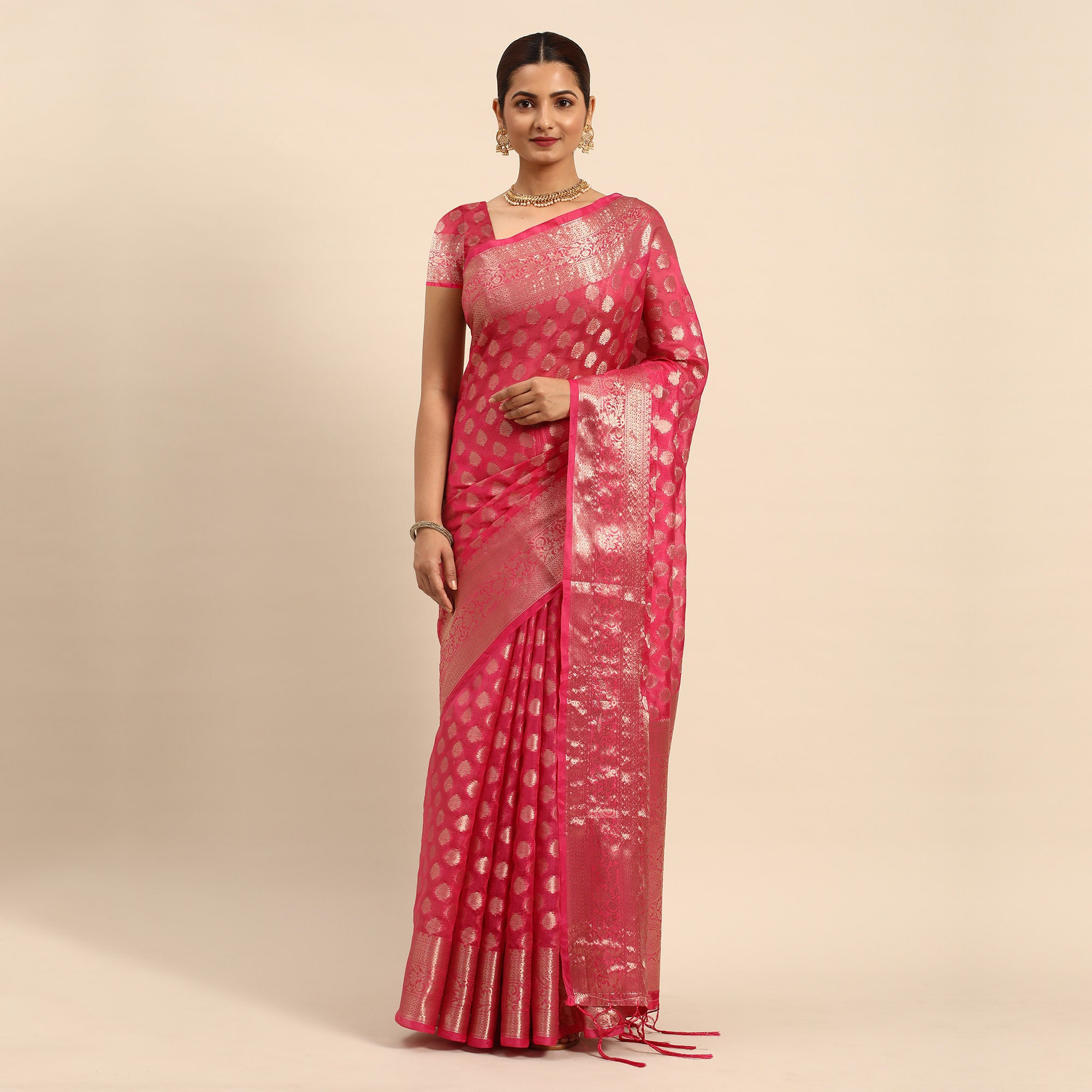 Rani Pink Woven Organza Silk Saree With Tassels