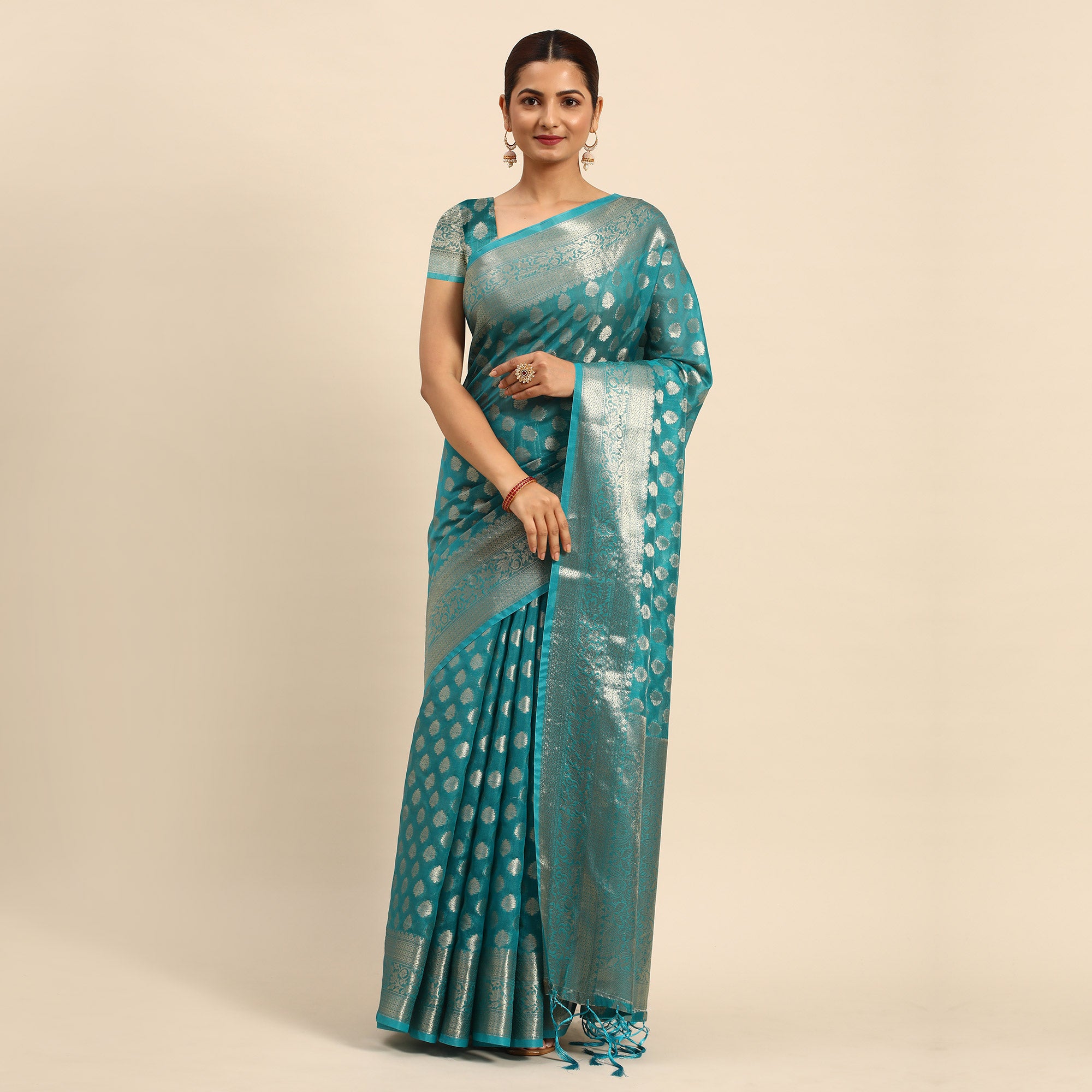 Turquoise Woven Organza Silk Saree With Tassels