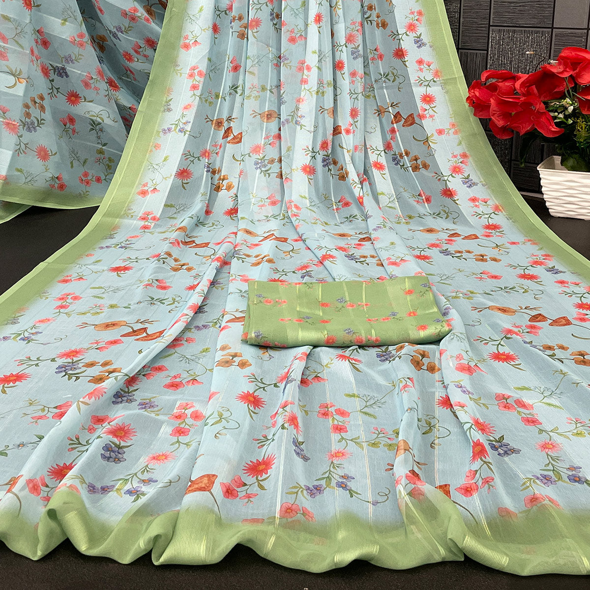Sky Blue Bloom Floral Digital Printed Georgette Saree Accentuated With Graceful Zari Stripes