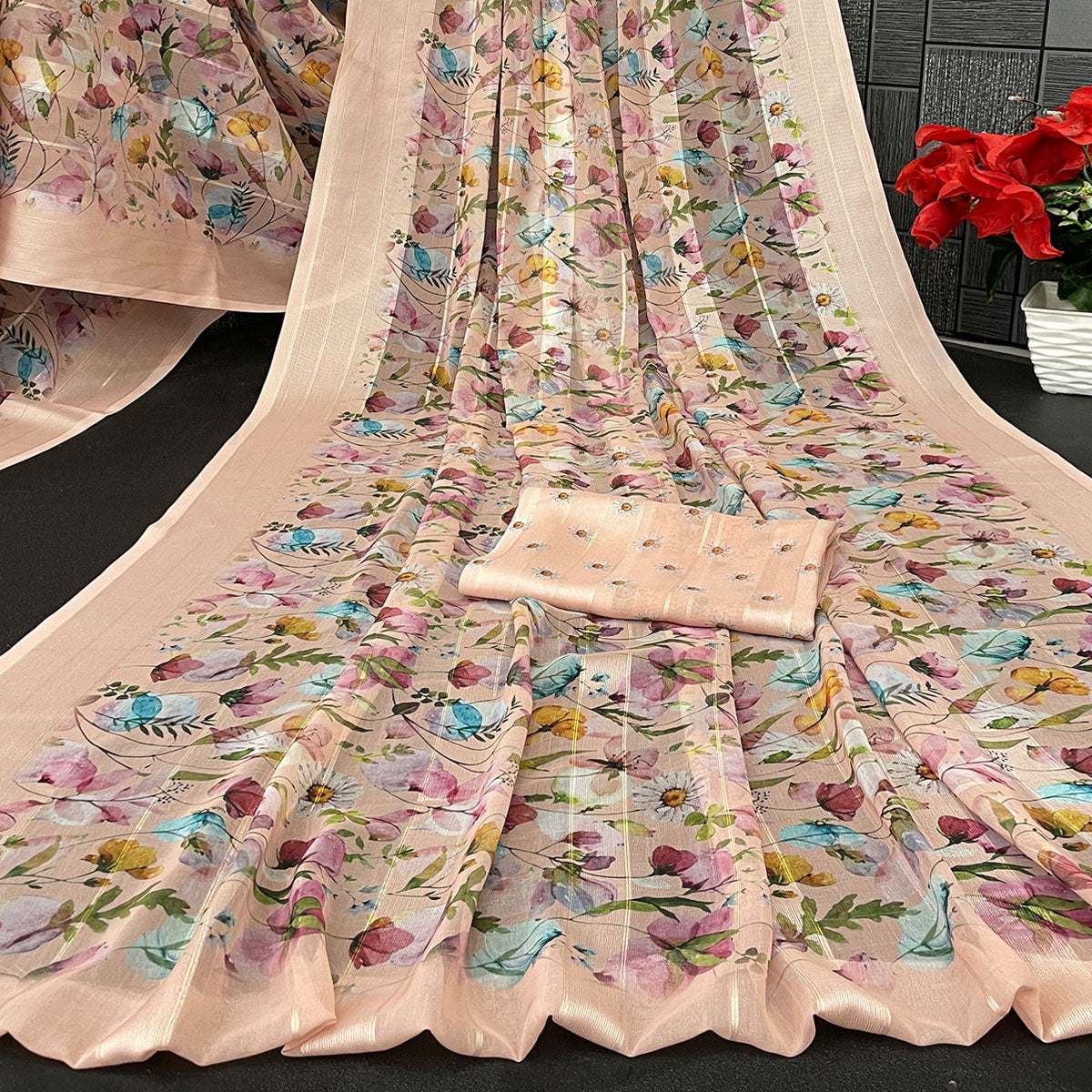 Peach Bloom Floral Digital Printed Georgette Saree Accentuated With Graceful Zari Stripes