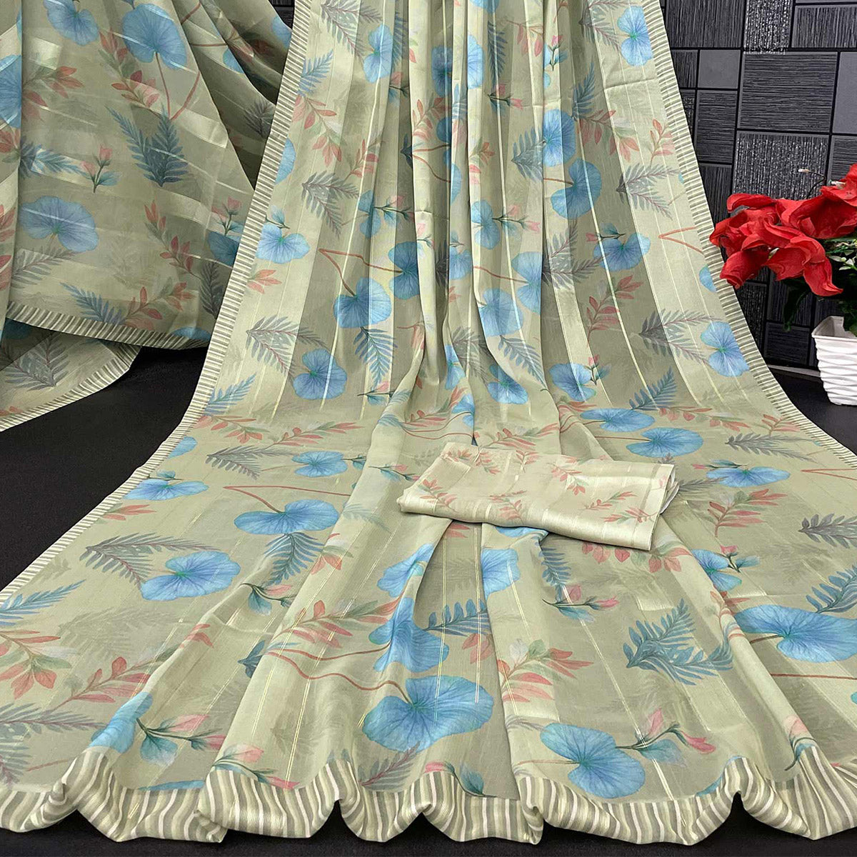 Pista Green Bloom Floral Digital Printed Georgette Saree Accentuated With Graceful Zari Stripes