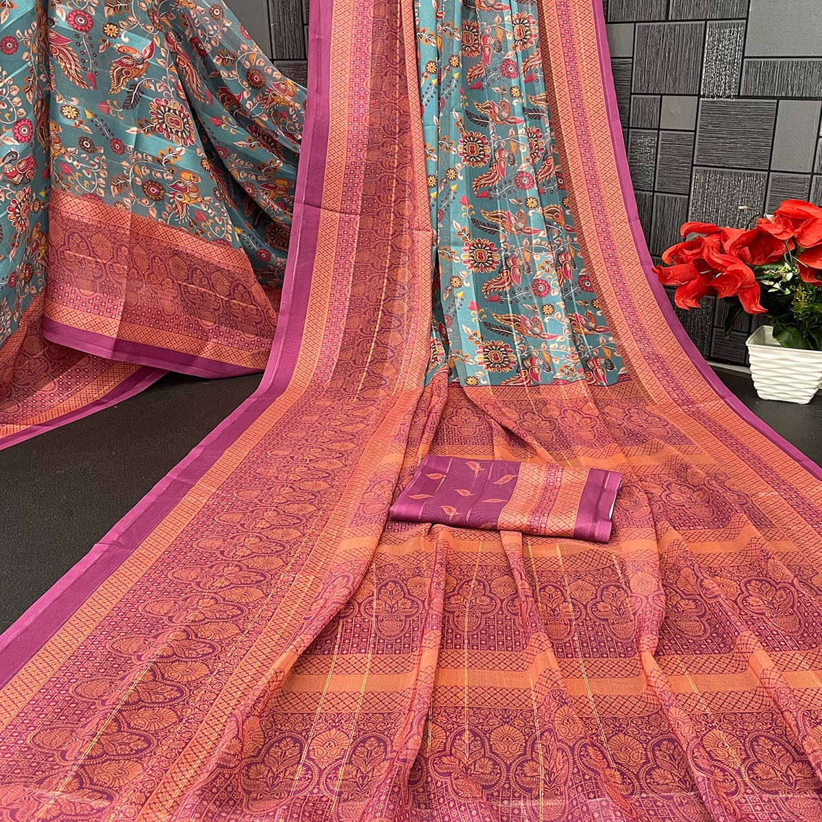 Elegant Rama Blue & Magenta Floral Digital Printed Georgette Saree Adorned With Subtle Zari Stripes