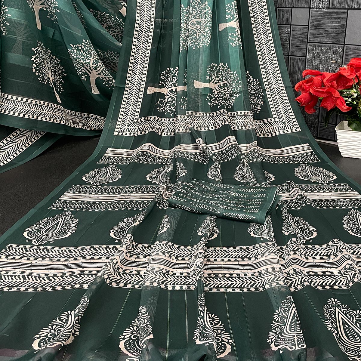 Charming Green Digital Tree Printed Georgette Saree Accentuated With Zari Stripes