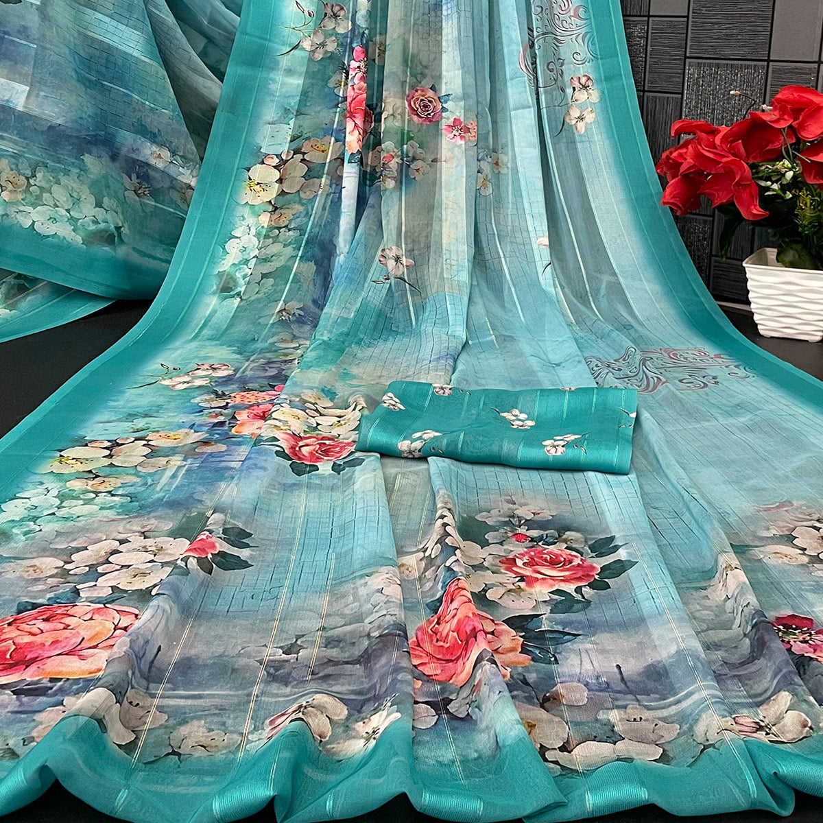 Charming Turquoise Blue Floral Digital Printed Georgette Saree Accentuated With Zari Stripes
