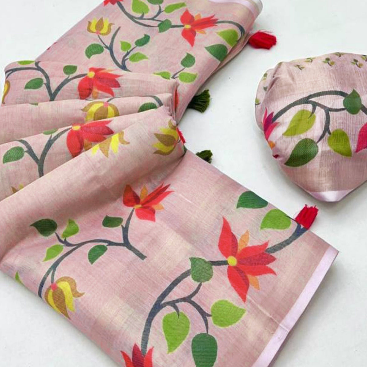 Pink Floral Printed Tissue Cotton Silk Saree Enhanced with a Classic Zari Weaving Border