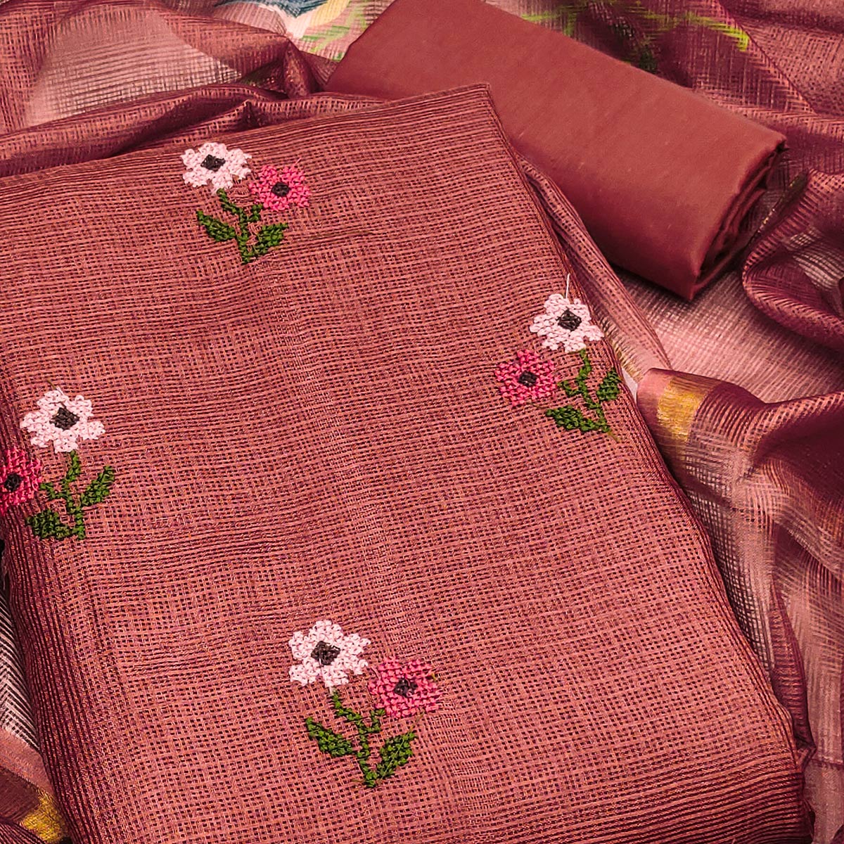 Unstitched Rust Suit Set in Soft Kota Doria Adorned with Floral Embroidery