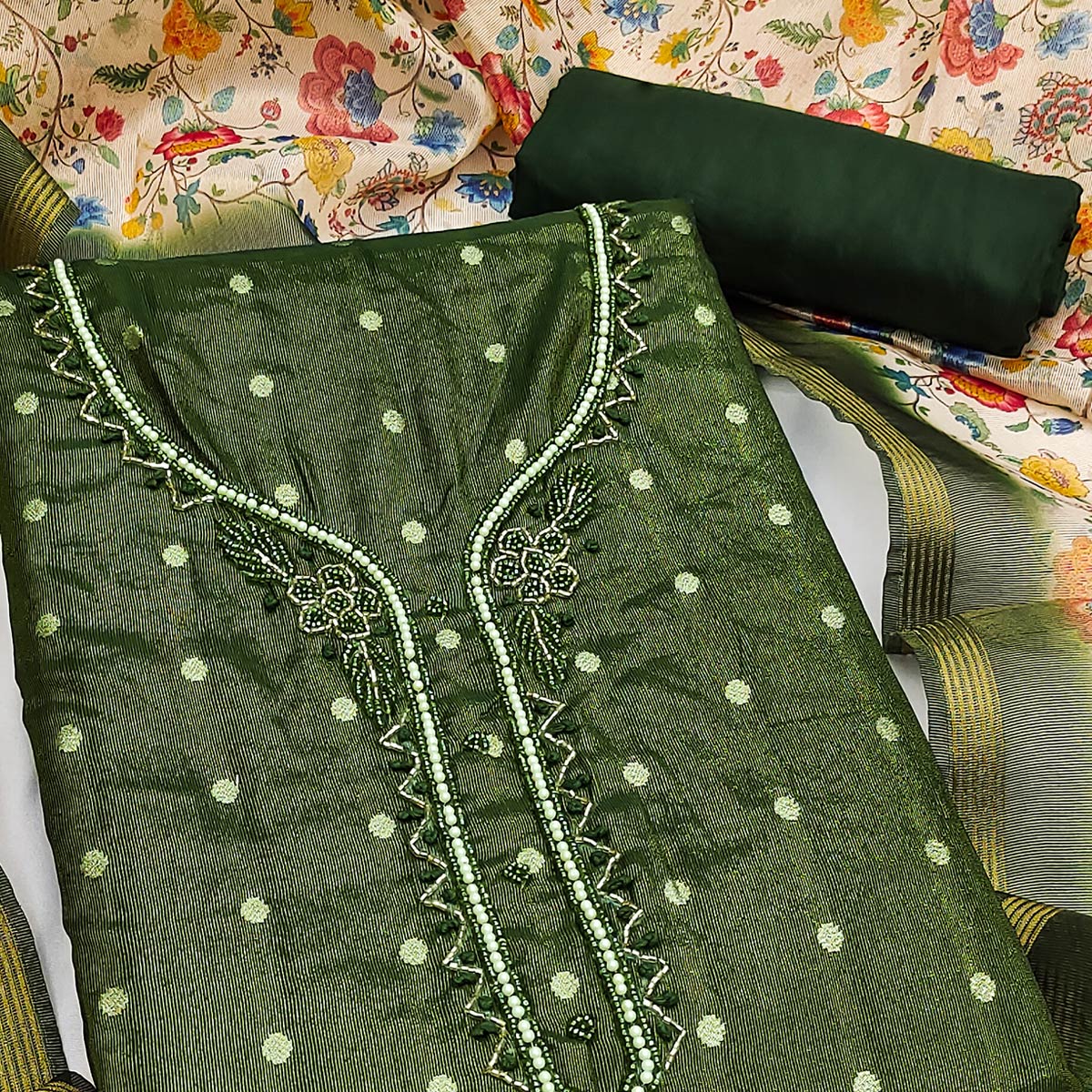 Festive Mehendi Green Net Dress Material Accented with Intricate Zari Weaving