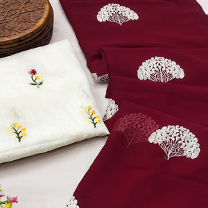 Maroon Thread Embroidered Georgette Saree With Tassels