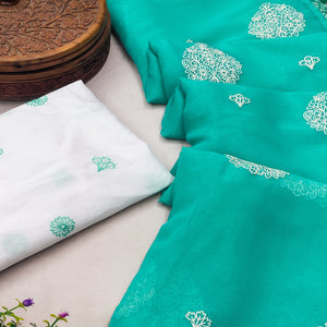 Turquoise Embroidered Chiffon Saree With Elegant Tassel Borders