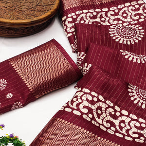 Classic Maroon Dola Silk Saree Adorned with Floral Motifs & Rich Zari Work