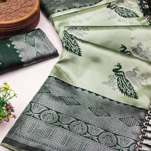Light Green Banarasi Silk Saree Featuring Zari Weaving Peacock Pattern & Luxe Tassels