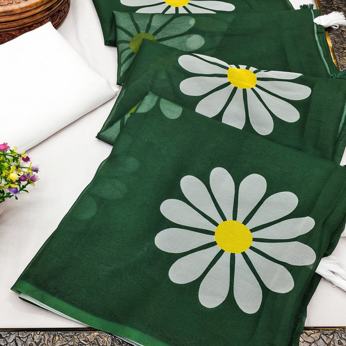 Dark Green Georgette Saree Featuring Delicate Floral Prints & Tassels Pallu