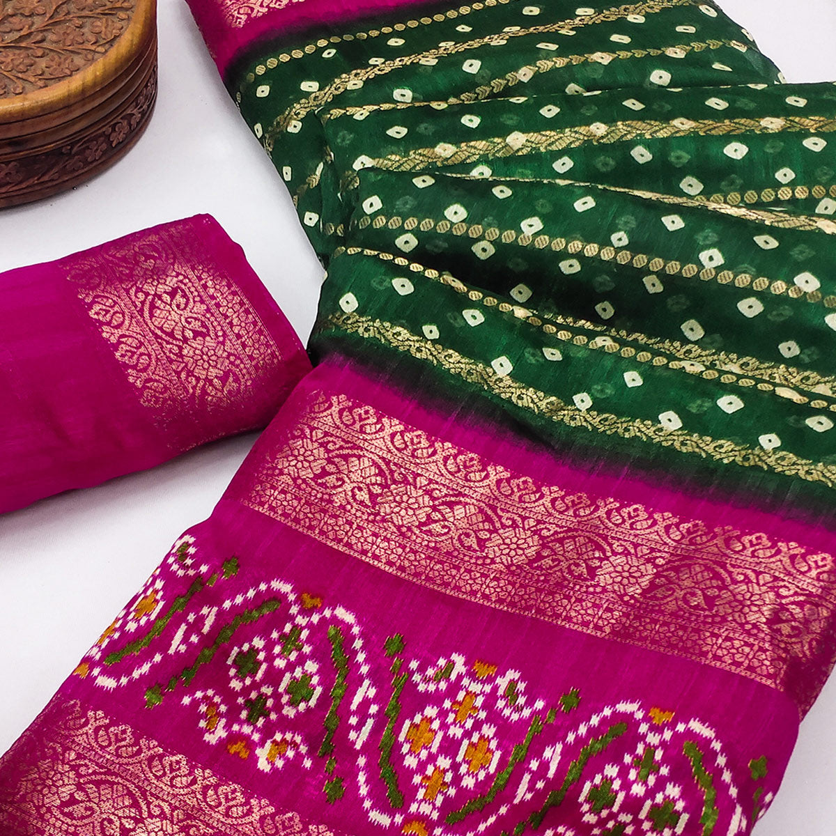 Green Dola Silk Saree With Traditional Bandhani Motifs & Intricate Zari Weaving Elegance
