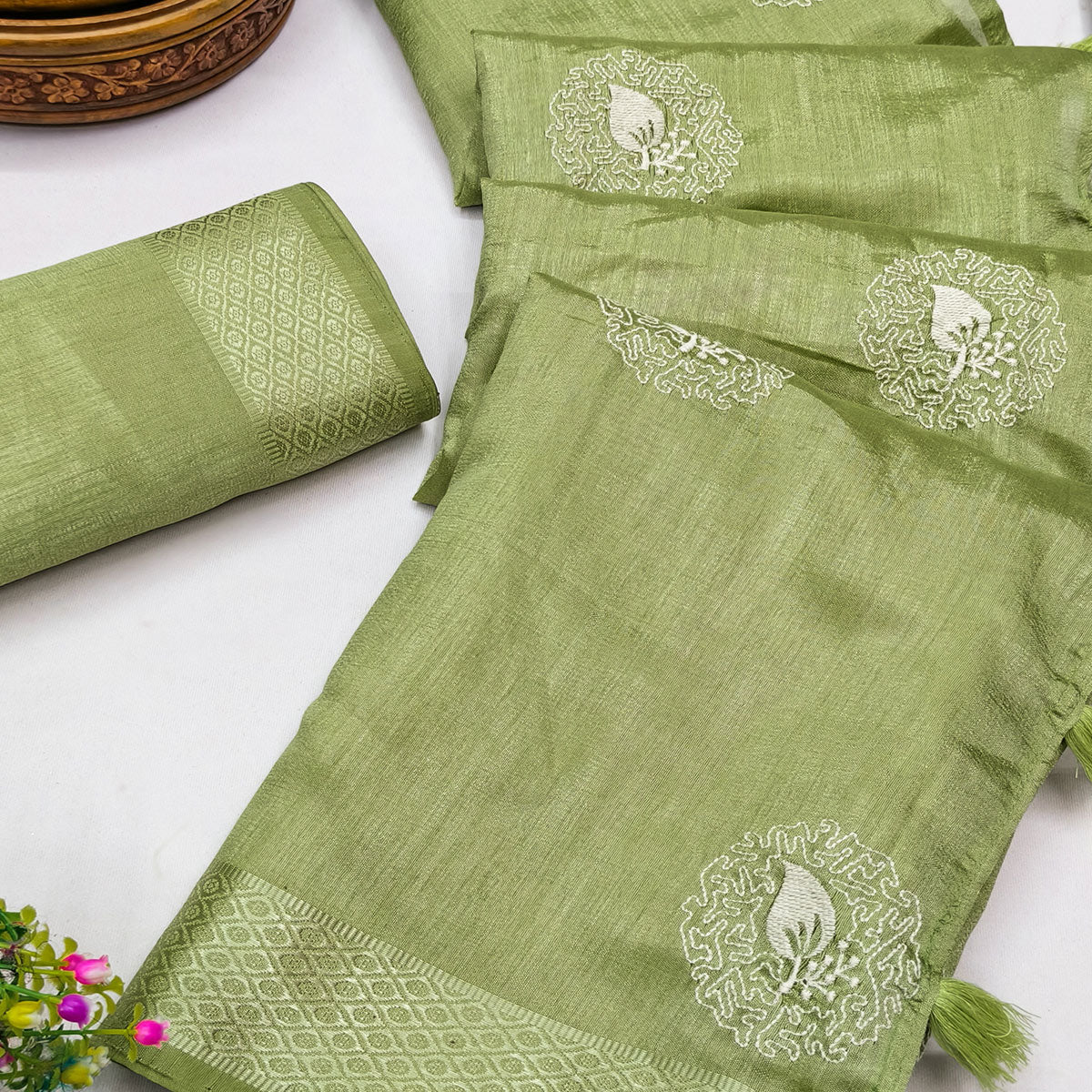 Pista Green Embroidered Art Silk Saree Adorned with Classic Zari Weaving Details