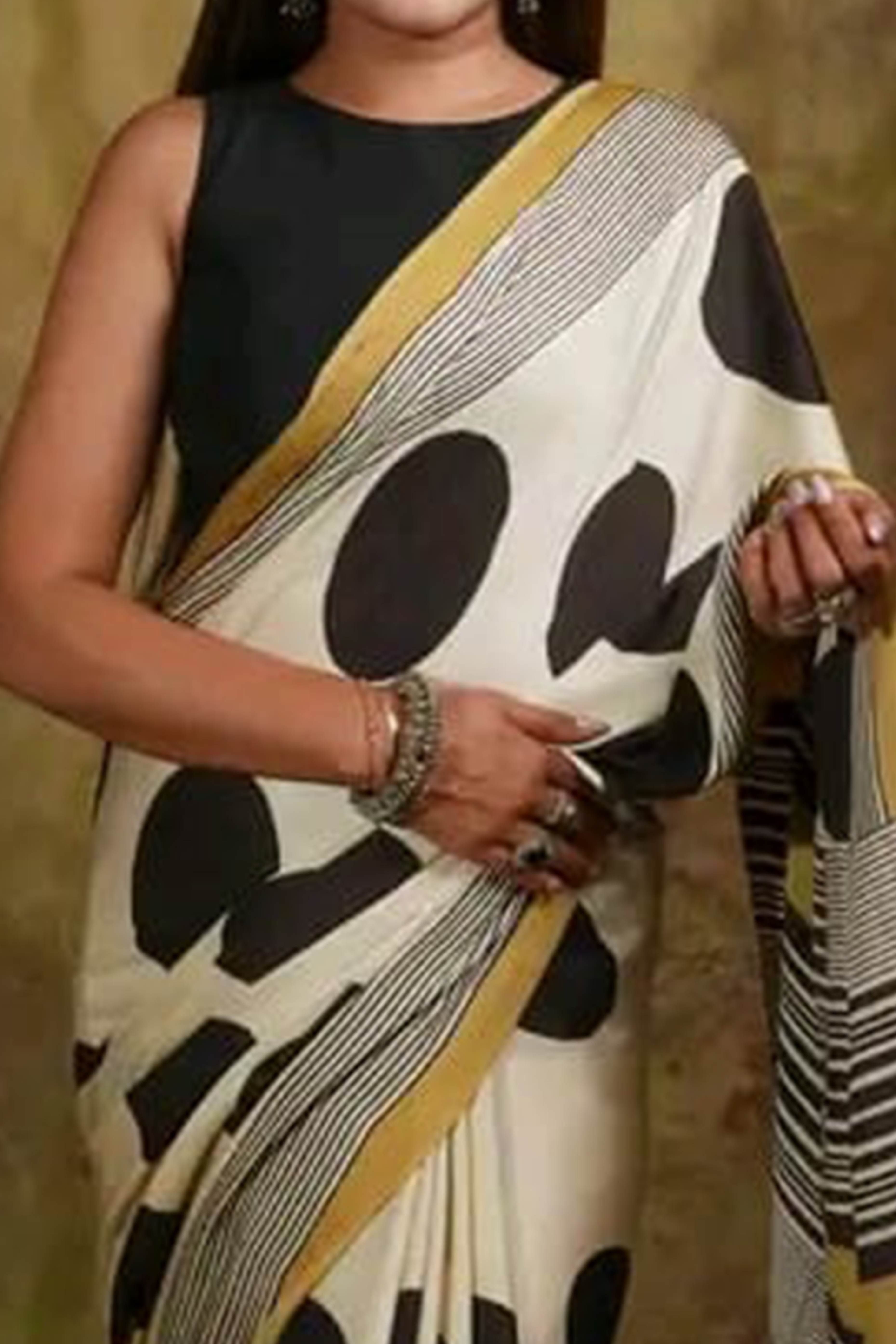 Graceful Offwhite Satin Saree Featuring Geometric & Striped Print With Tassel Pallu