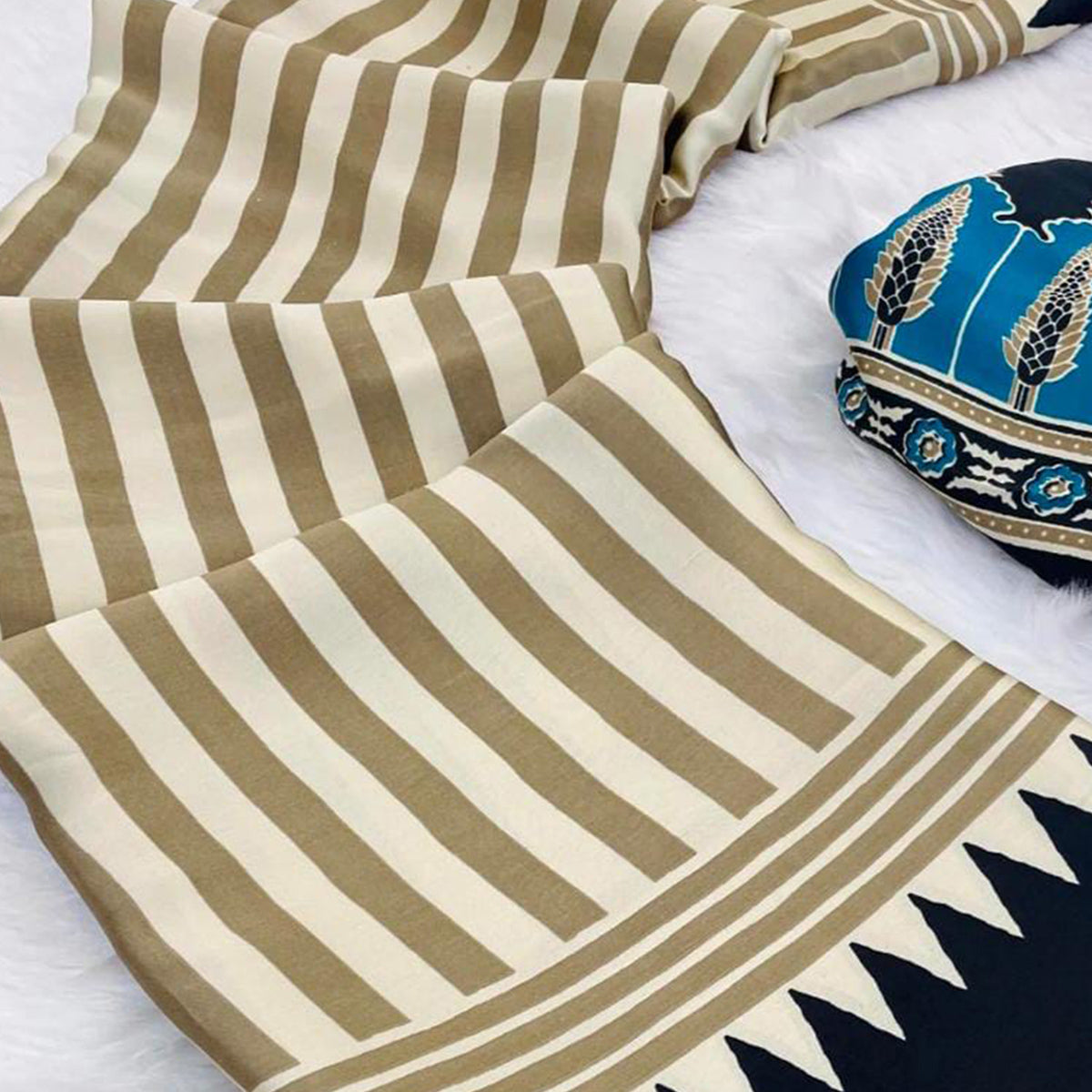 Graceful Chikoo & Black Crepe Silk Blend Saree Adorned with Bold Striped Print Work