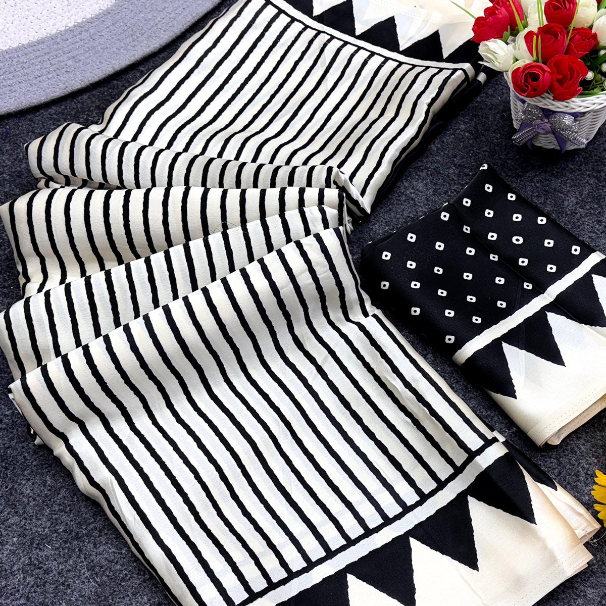 Party Perfect Off White & Black Saree Crafted in Cream Crepe Fabric with Striped Print