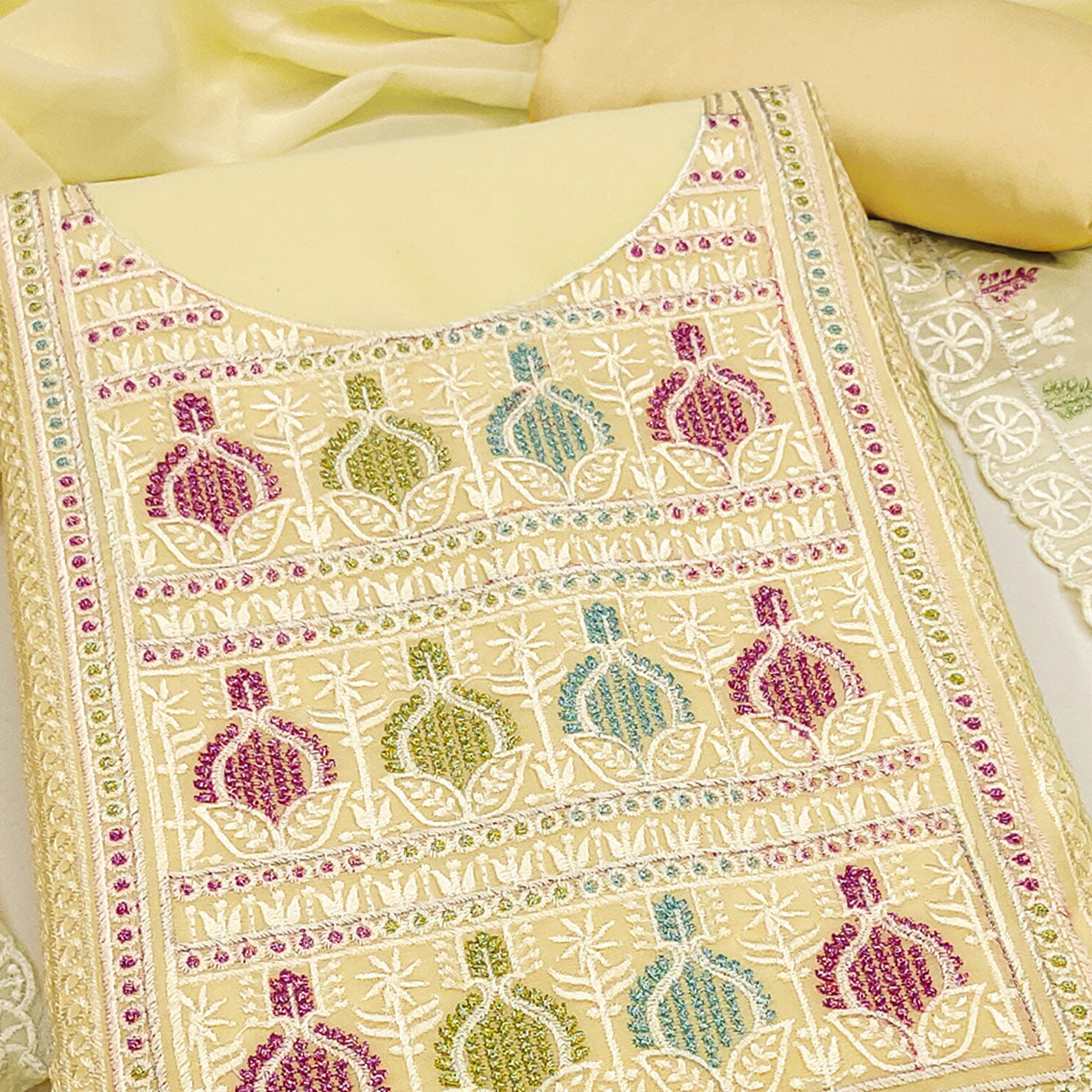 Sophisticated Yellow Georgette Dress Material Accented With Ornate Floral Thread Embroidery