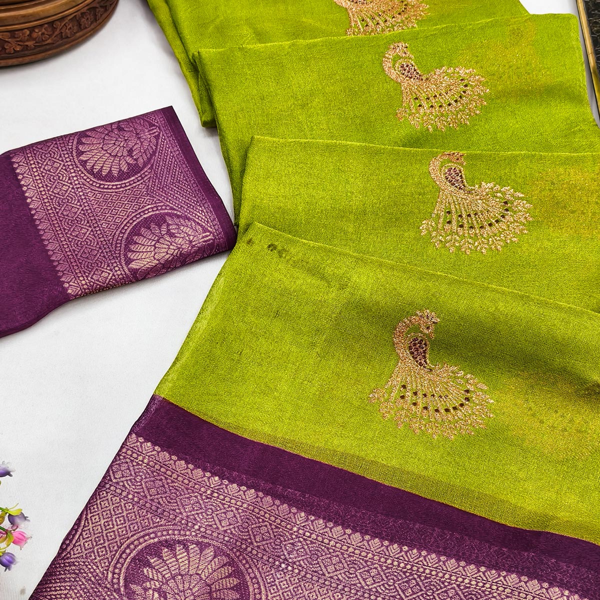 Festive Light Green Dola Silk Saree Enhanced with Ornate Zari Weaving