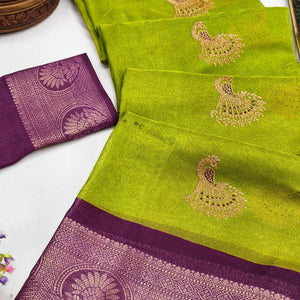 Festive Light Green Dola Silk Saree Enhanced with Ornate Zari Weaving