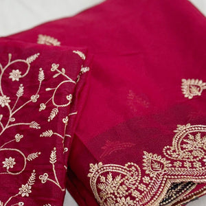 Gorgeous Pink Floral Embroidered Georgette Saree Accented With Luxurious Zari Work