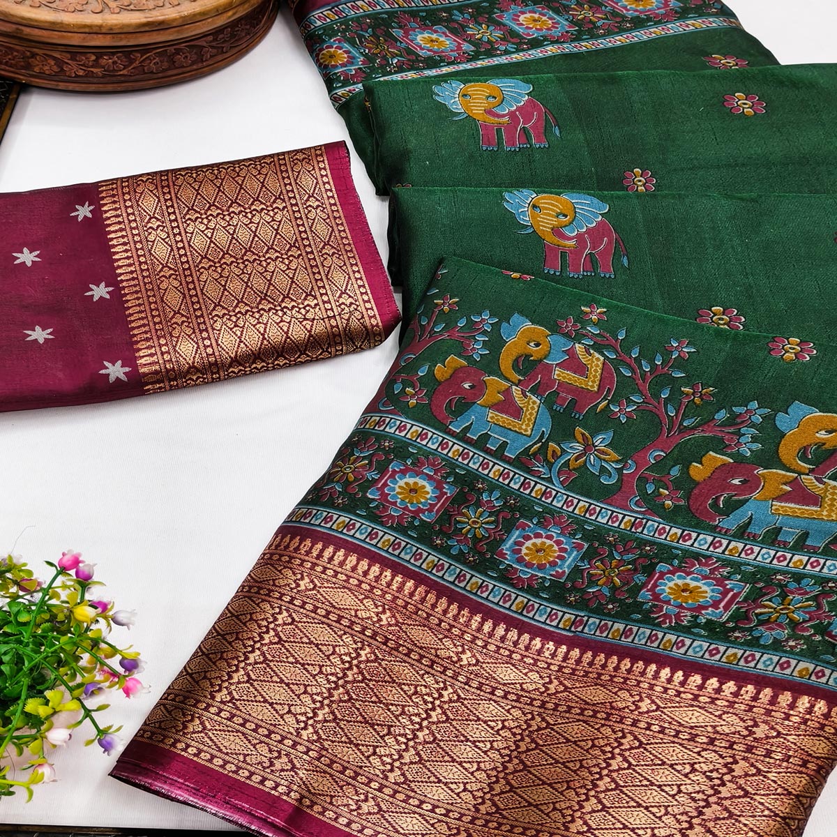 Majestic Green stard Elephant & Floral Printed Dola Silk Saree Featuring Intricate Weaving Border