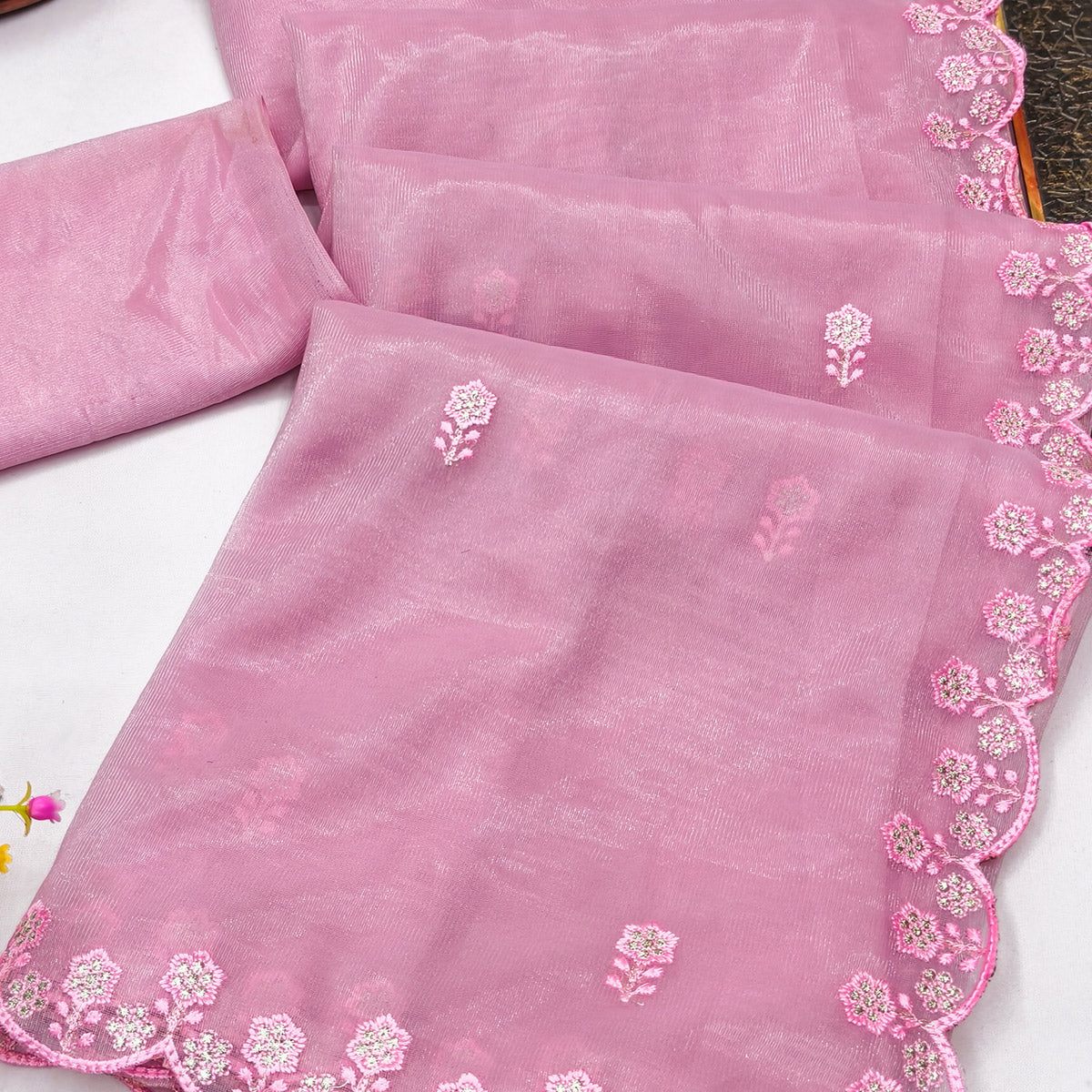 Pink Net Partywear Saree Featuring Fine Floral Embroidery and a Soft, Flowing Look