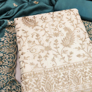 Cream & Teal Lustrous Vichitra Silk Dress Material Accented with Artistic Thread Embroidery