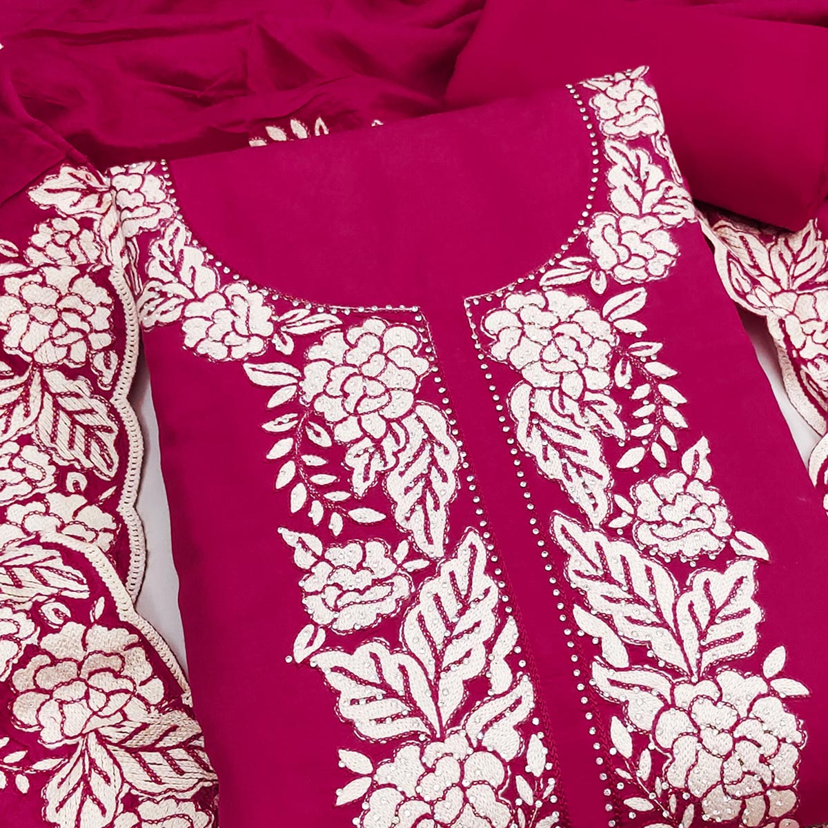 Pink Rich Viscose Dress Material Highlighted with Refined Floral Thread Embroidery