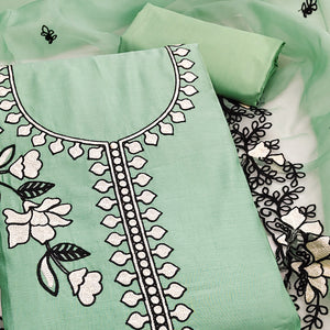 Graceful Mint Green Floral Viscose Dress Material Enhanced With Intricate Thread Embroidery Work