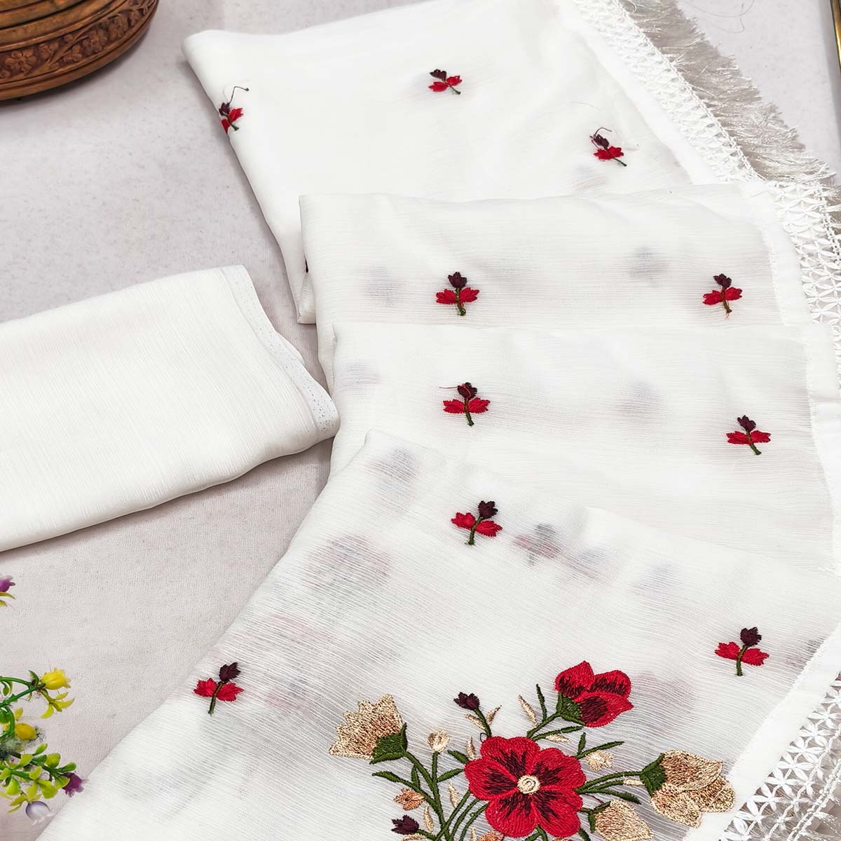 White Floral Embroidered Chiffon Saree With Tassels