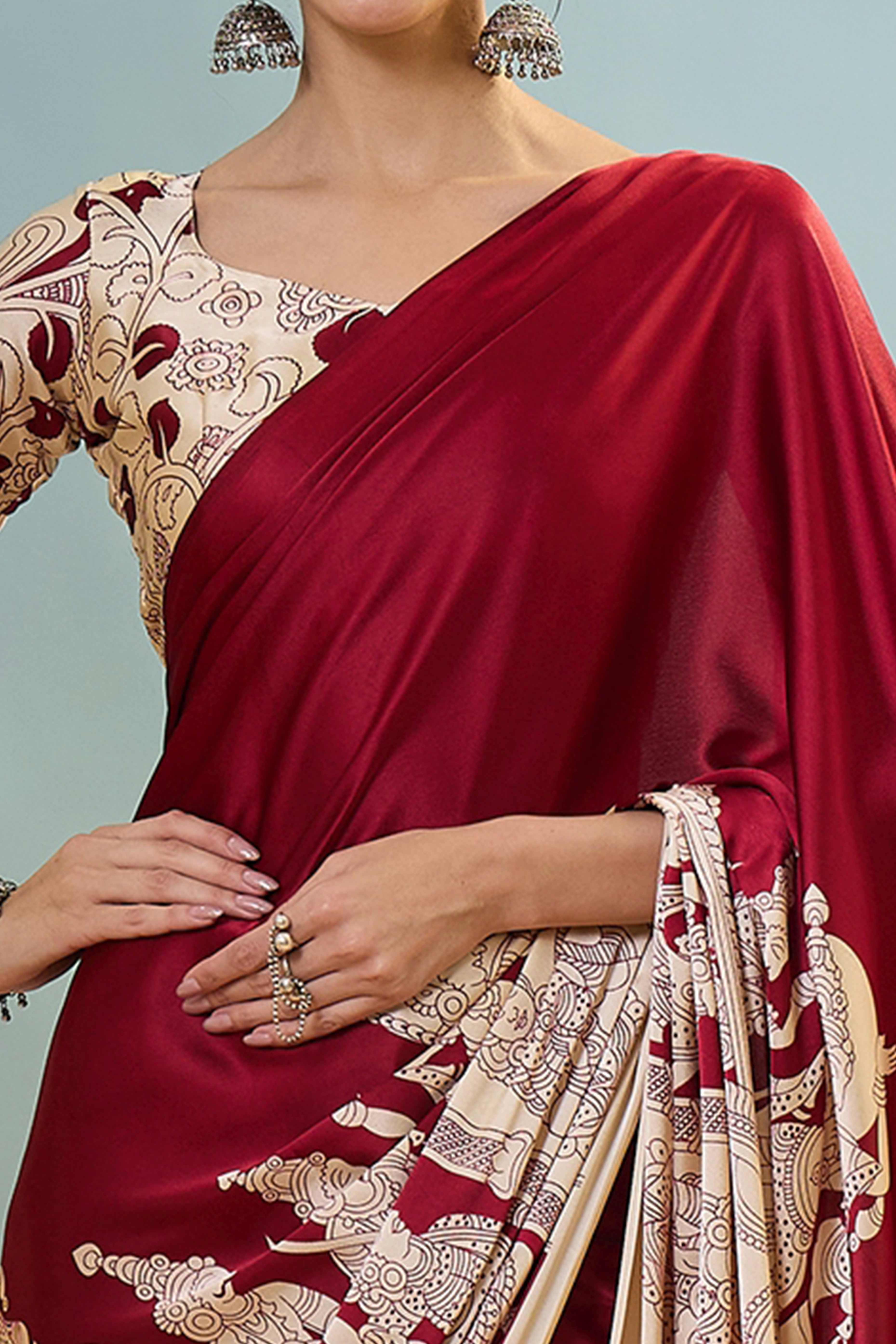 Red Kalamkari Style Modal Satin Saree Featuring Intricate Artistic Prints
