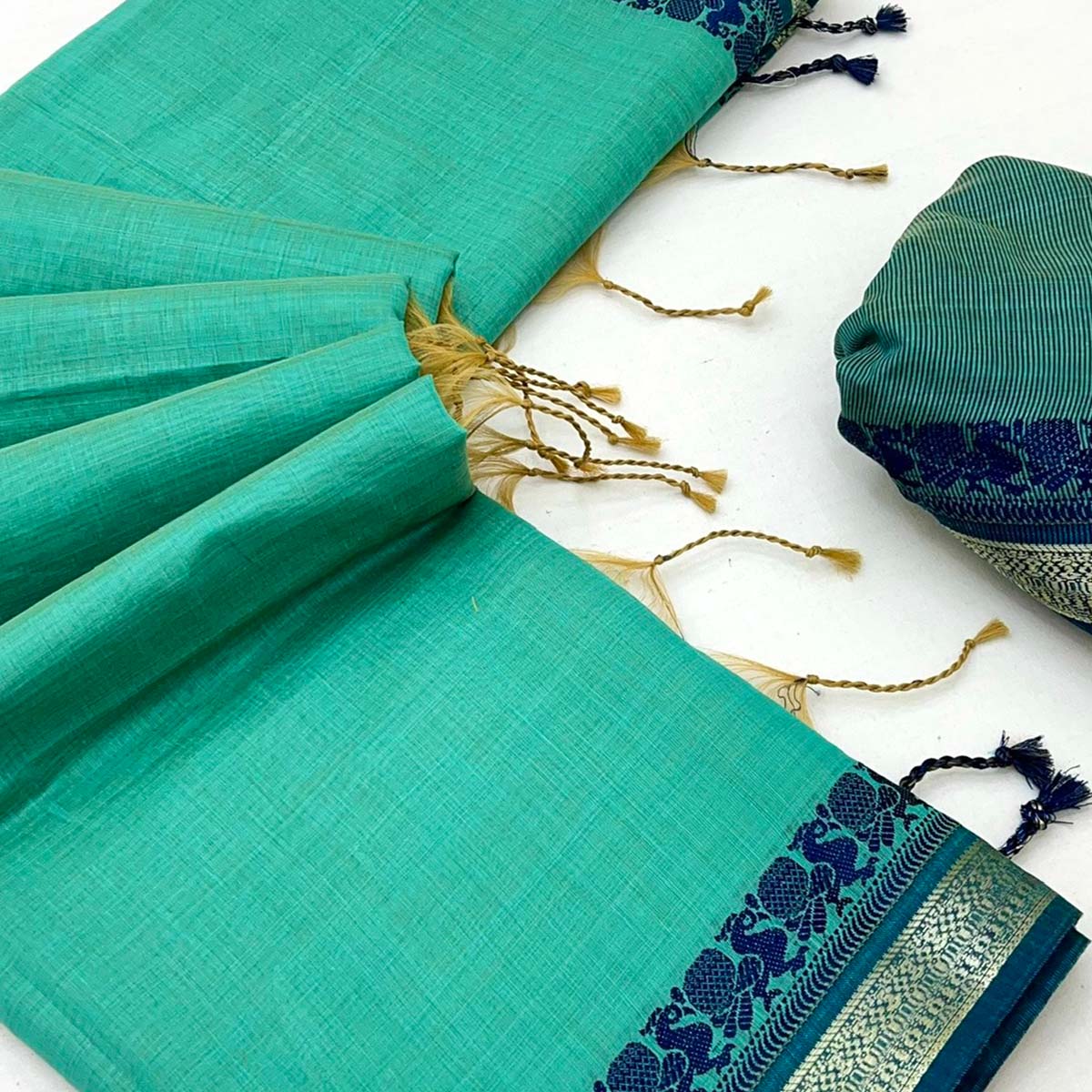 Turquoise Pure Handloom Silk Saree with an Elegantly Woven Jacquard Border