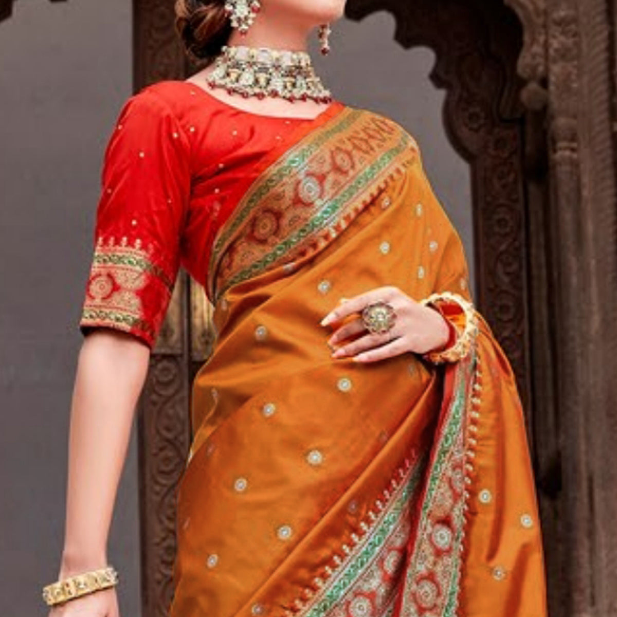 Orange Woven Pure Silk Saree With With Tassels