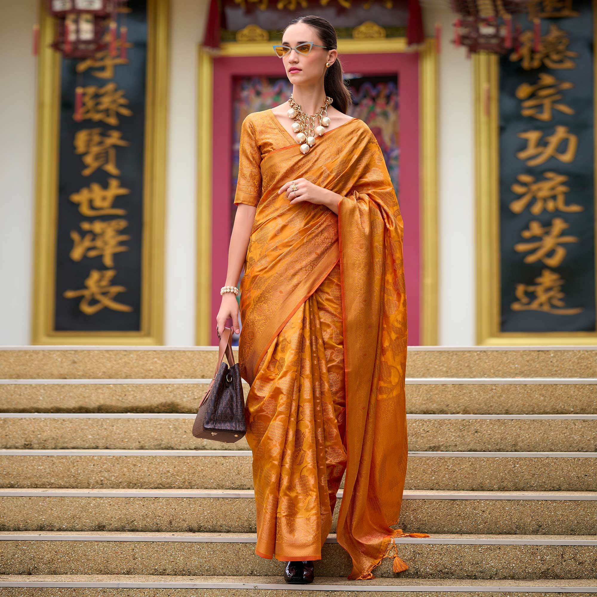 Warm Orange Floral Motifs Woven Organza Saree