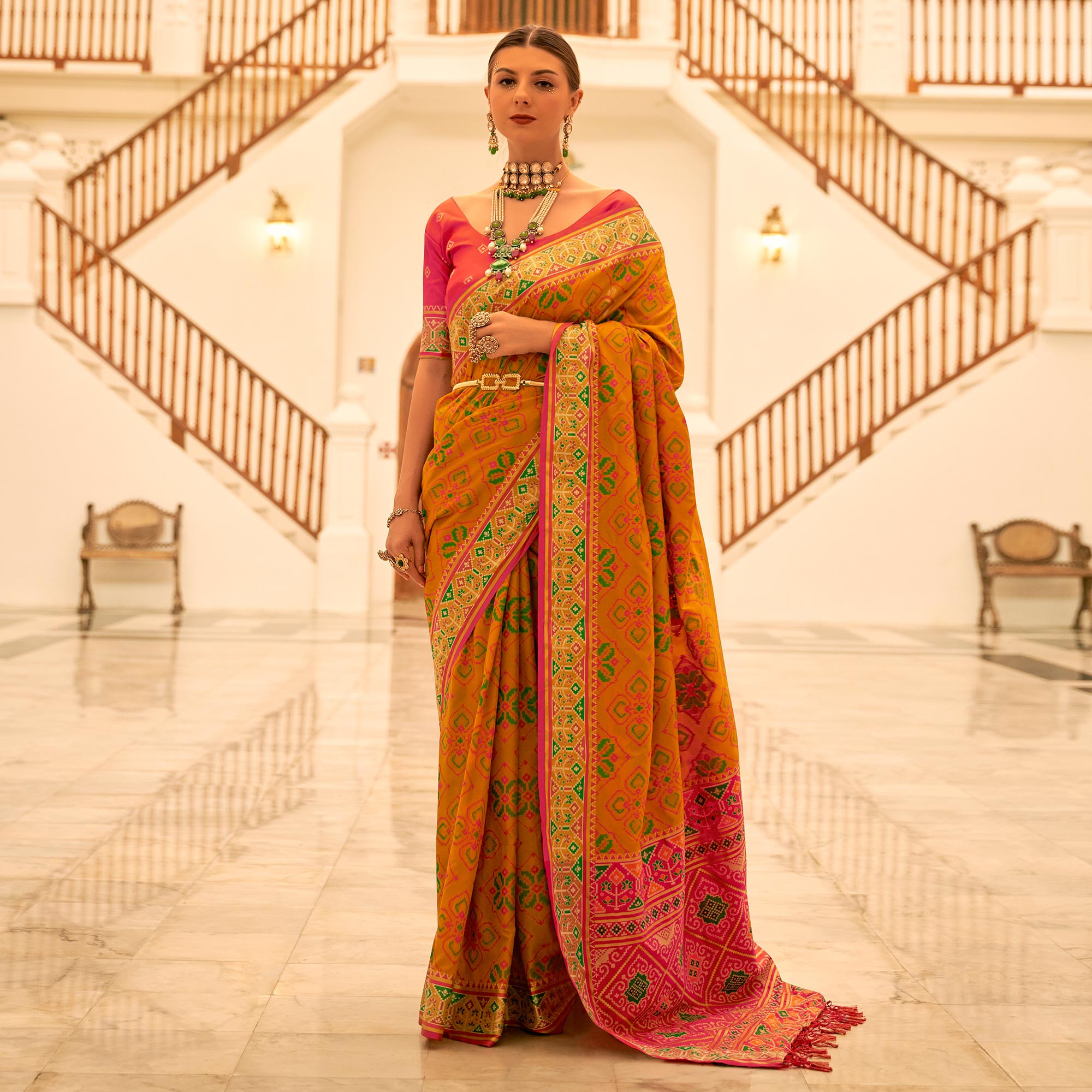 Mustard Patola Printed Banarasi Silk Saree With Tassels