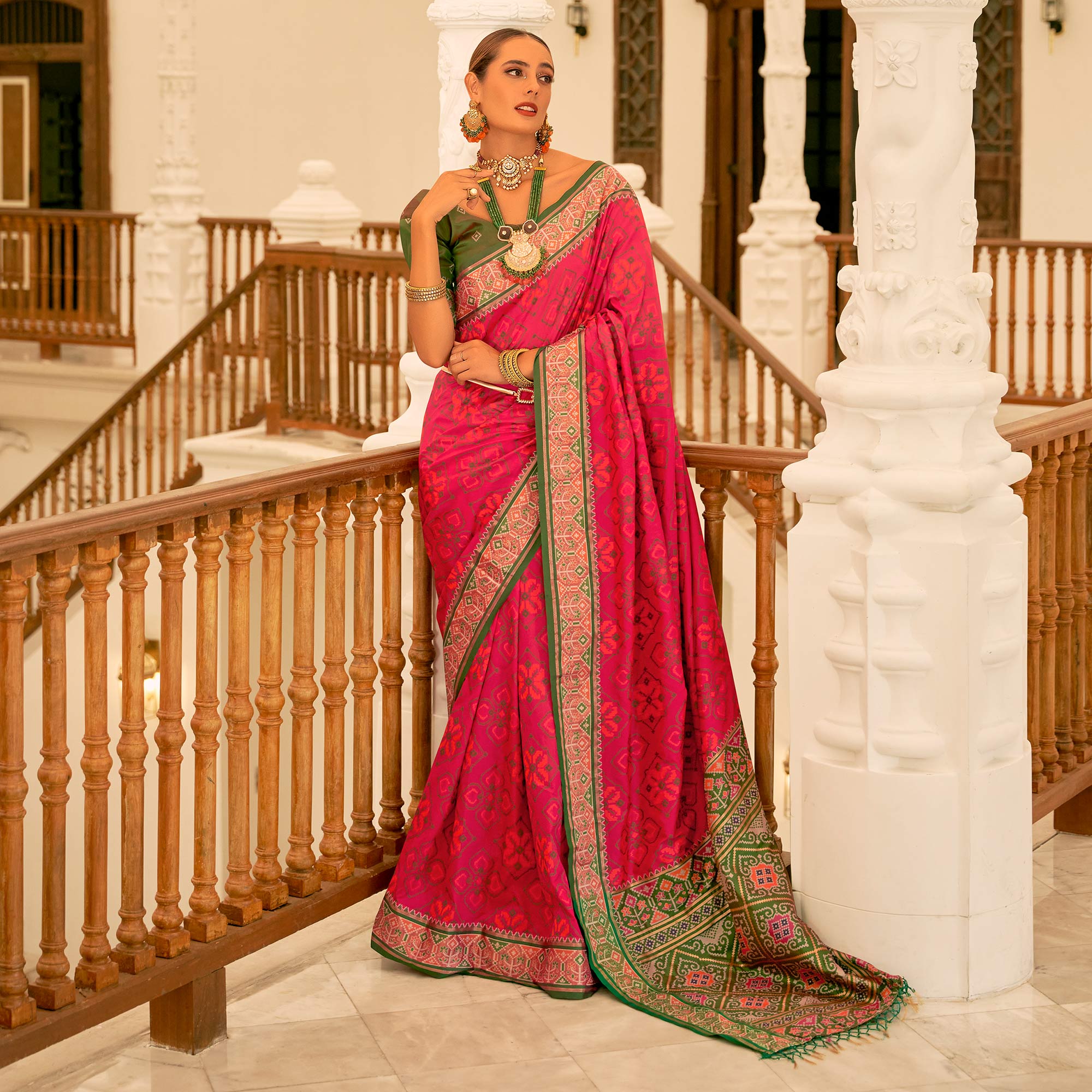 Rani Pink Patola Printed Banarasi Silk Saree With Tassels