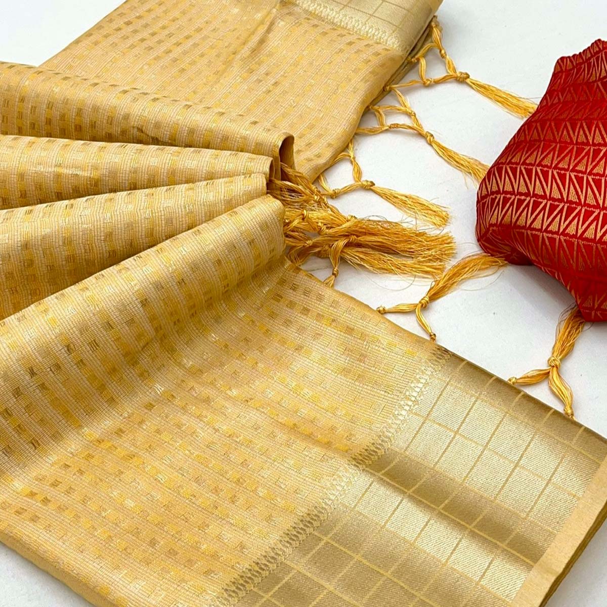 Yellow Soft Tissue Saree Featuring Rich Zari-Woven Detailing.
