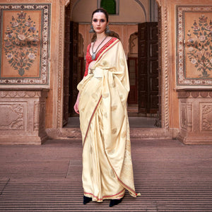 Cream Woven Satin Saree With Tassels